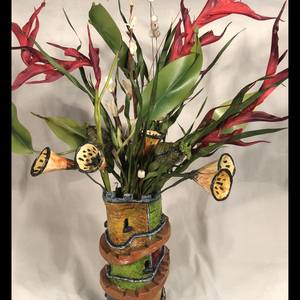 Whimsical Clay Vase Sculpture and Flowers