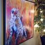This magnificent piece makes a statement in any room and prints well on a large canvas. The cheetah is full of fire and grace, but is calculating and calm as it looks off the canvas into the distance. This painting was done on a gallery wrapped canvas in acrylic, using a brush and palette knife - on a fiery red and orange background. The original comes framed in a wooden distressed black floater.