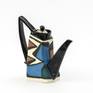 This teapot is one of the best work in its  branch and unique example of contemporary ceramic art