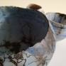 I love to make Raku firing.It's an exciting process using open fire and each work looks different.I hand build the work with special clay that is strong enough to pass the shock of firing.This turquoise bowl made by a unique technique combining an ancient Japanese firing method. with the application of a horse's tail hair the black marks of horse hair makes the bowl a one of a kind and unique decor piece.