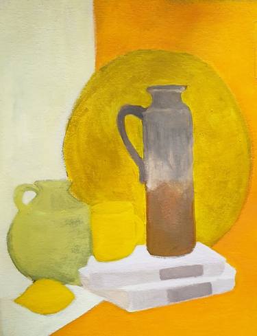 Still life composition yellow lemon mug saucer books green thumb