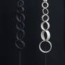NECKLACES
These sculptures are made of black porcelain. As their name indicates, the pieces that compose them are like beads of necklaces set in the verticality of an iron rod. Making them for me is like a game, an amusement.