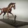 While in the French Camargue, I saw a wild horse spooked by a snake and veer away suddenly. Although the snake was not a cobra, I wanted to recreate that action, that sudden movement that testifies to fright. The finish is smooth and the patina a rich brown with black and gold highlights.

Ltd Ed 12