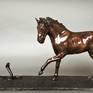 While in the French Camargue, I saw a wild horse spooked by a snake and veer away suddenly. Although the snake was not a cobra, I wanted to recreate that action, that sudden movement that testifies to fright. The finish is smooth and the patina a rich brown with black and gold highlights.

Ltd Ed 12