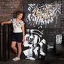 Vera DG with the artworks in the interior of Black Loft Style