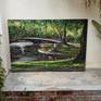 In the saavedra park of the city of buenos aires, there was a family on the edge of the lake, playing in its orrilas with a paper boat.

Size: 70 × 100 cm
