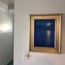 Small paintings work well in transition areas such as hallways