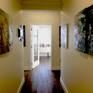 "Beginnings" on left corridor wall of gallery (colors intensified by low-light conditions)