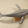 The sculpture was created as an attempt to consider, to get acquainted with such a grandiose mammal as a whale. Unfortunately, not many people manage to meet a real whale in their lives. I have not yet succeeded!
This sculpture is made of resin with aluminum powder and is mounted on an oak stand.