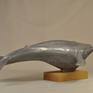 The sculpture was created as an attempt to consider, to get acquainted with such a grandiose mammal as a whale. Unfortunately, not many people manage to meet a real whale in their lives. I have not yet succeeded!
This sculpture is made of resin with aluminum powder and is mounted on an oak stand.