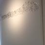 A contemporary piece of art created using Platinum and Silver leaf inspired by the Swiss Alps.