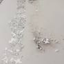 A contemporary piece of art created using Platinum and Silver leaf inspired by the Swiss Alps.