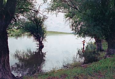 Fishing on the river thumb