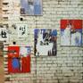 This artwork combines abstract acrylic painting with pieces of magazines, newspapers and image of american flag.