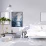 Blue white abstract landscape in a bright bedroom