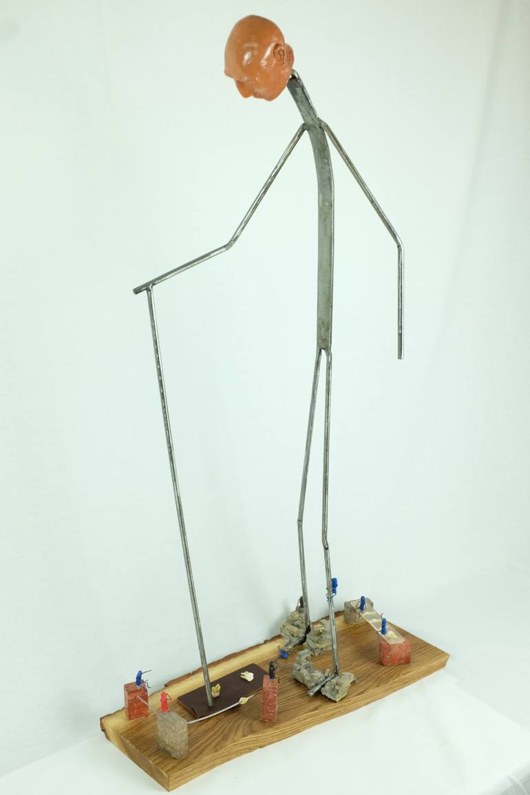 Original Figurative People Sculpture by Nikos Mantziaris