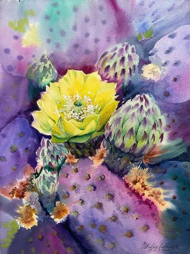 Blooming cactus thumb