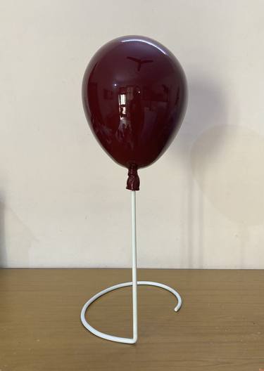 Dark red balloon thumb