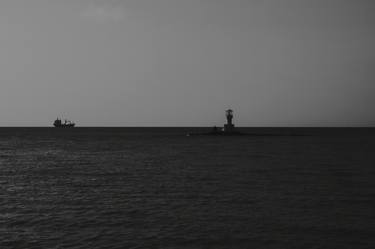 Lighthouse In The Sea thumb