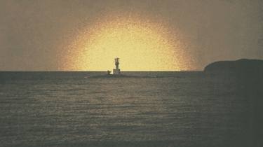 A Lighthouse In The Sea thumb