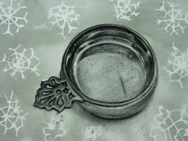 A silver vessel on snowflake pattern tablecloth thumb