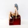 She is part of my Red Plinth Collection, from my life drawing sketches.  Hand made and fired at a temperature to keep that rich red glaze.  Using oxides to show all the tool marks.