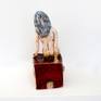 She is part of my Red Plinth Collection, from my life drawing sketches.  Hand made and fired at a temperature to keep that rich red glaze.  Using oxides to show all the tool marks.