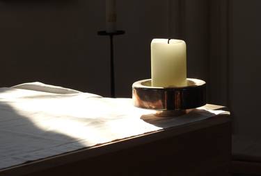 Candle in a church thumb