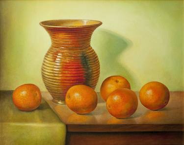 Oranges with a vase thumb