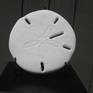 This sand dollar sculpture is named for Susan B. Anthony the 19th century social reformer whose image (coincidentally?) appears on the US $1 coin.   The sculpture "Susan" is the letter "S" entry in a 26 piece series of fish sculptures.   The series is titled "Age of Aquarium"