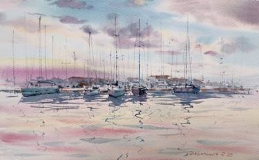 Yachts on the pier in a pink sunset thumb