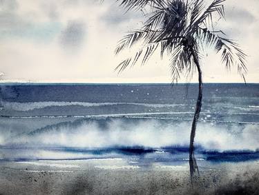 Palm tree on the beach thumb