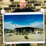 Richard Heeps holding Homestead III print.