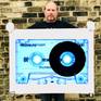 Richard holding Heidler and Heeps tape collection Chrome blue print.