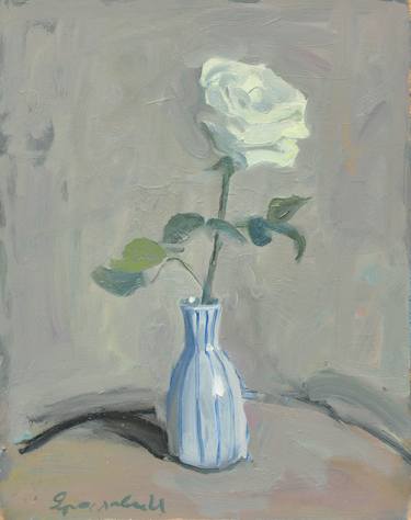 White rose in striped vase thumb