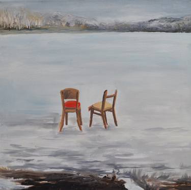 Two chairs on the frozen lake thumb