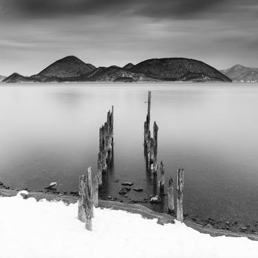 Wooden sticks in the water at lake Toya, Hokkaido - Limited Edition of 5 thumb