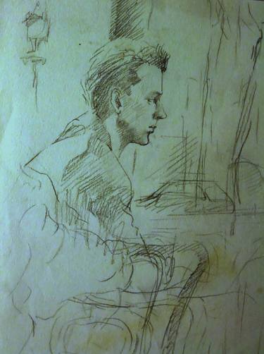 A young man at the coffeeshop in Paris thumb