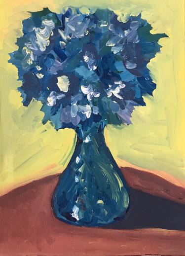 Violet flowers in a blue vase thumb