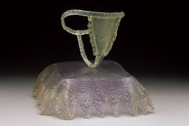 Glass thong on glass lace tablecloth thumb