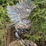This work was made of hot forged metal by me. Each feather was made manually. The body was made of iron. The body itself is airtight. The eyes were made of glass. The owl sits on its own in the snag. The snag was also made of metal. 
This work is no longer available. 
But I will gladly make one for you. There will be no exact copy. Since this is a handcrafted work. But I promise you, it will be no worse. I put my heart and soul into every art. In every art I do, there are only positive emotions.