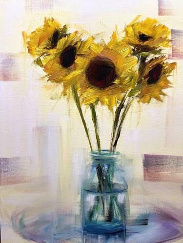 Sunflowers on the light thumb