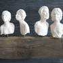 3 women and 1 man : Clay sculpture