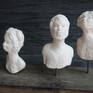 Clay sculpture - white faces - Family time