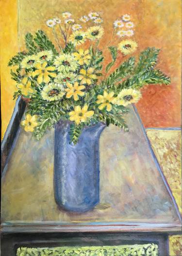 Yellow daisies in a grey vase thumb