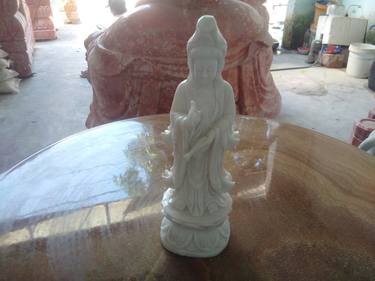 White marble statue Kuan Yin on Lotus thumb