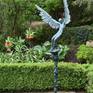 'Icarus X' bronze by poolside.