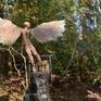 life-sized sculpture of Icarus taking flight
