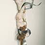 Side view of Siren hung on a wall