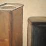 Still life with metal boxes or the same as if they were buildings of big city.